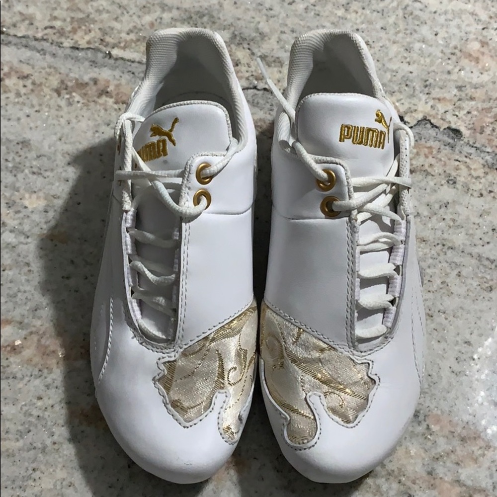Puma shoes with satin gold detail